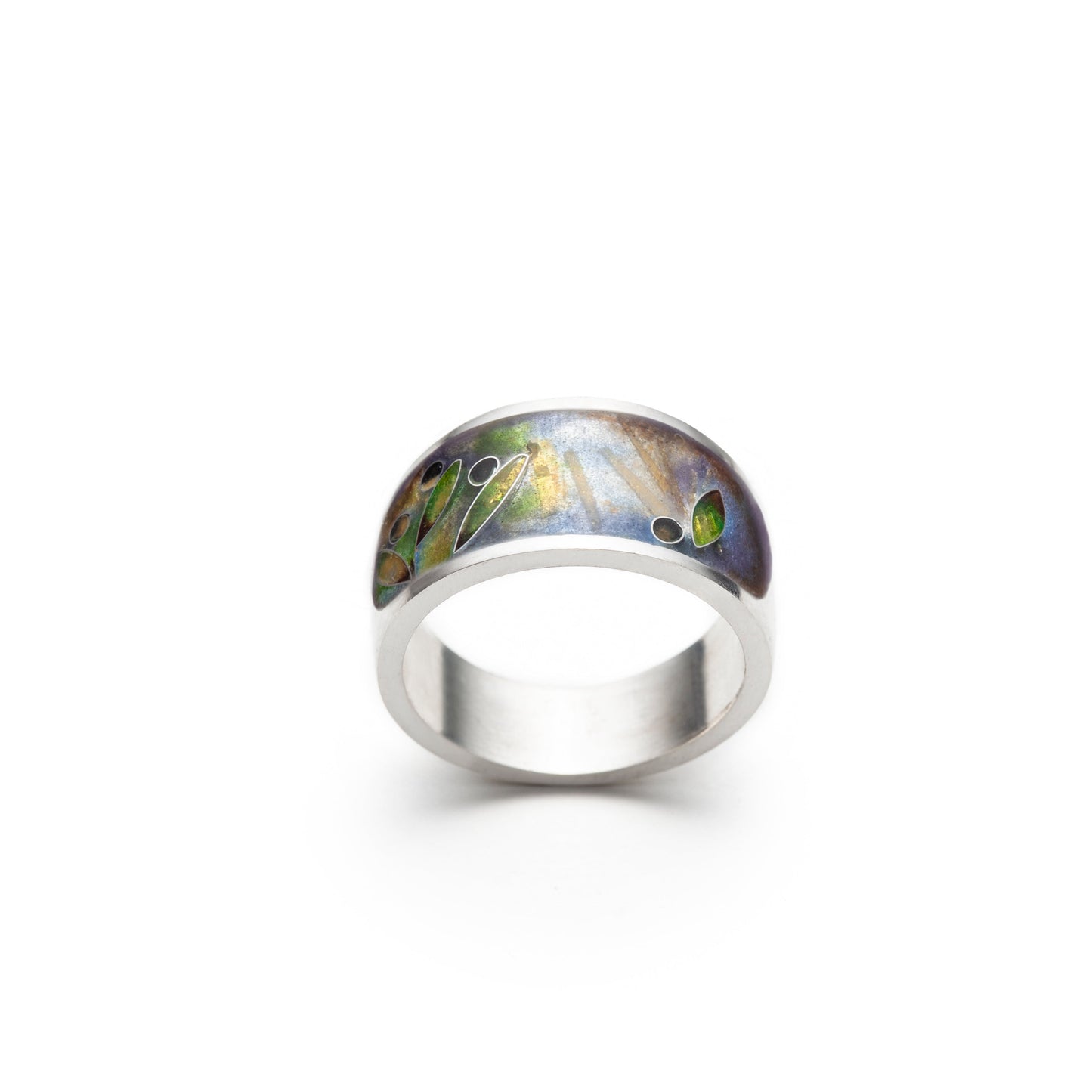 Silver ring with a floral design on a white background