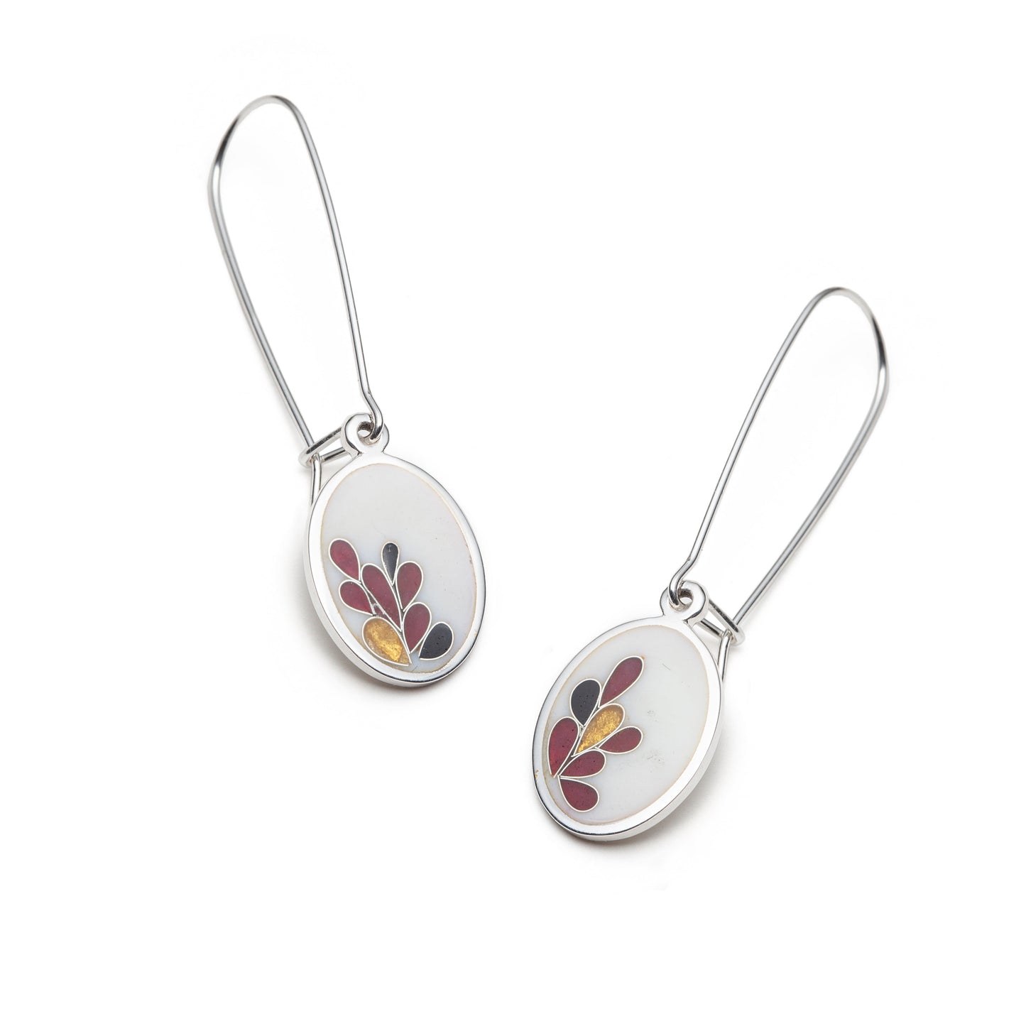 Pair of earrings with floral design on a white background