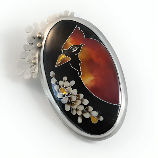 Brooch with a red cardinal