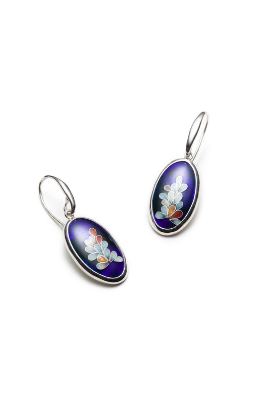 Blue oval earrings with floral designs