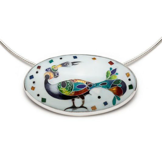 Colorful peacock pendant on a white background