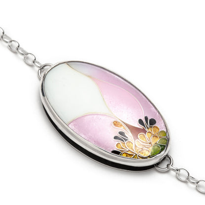 Necklace with a floral pendant on a white background